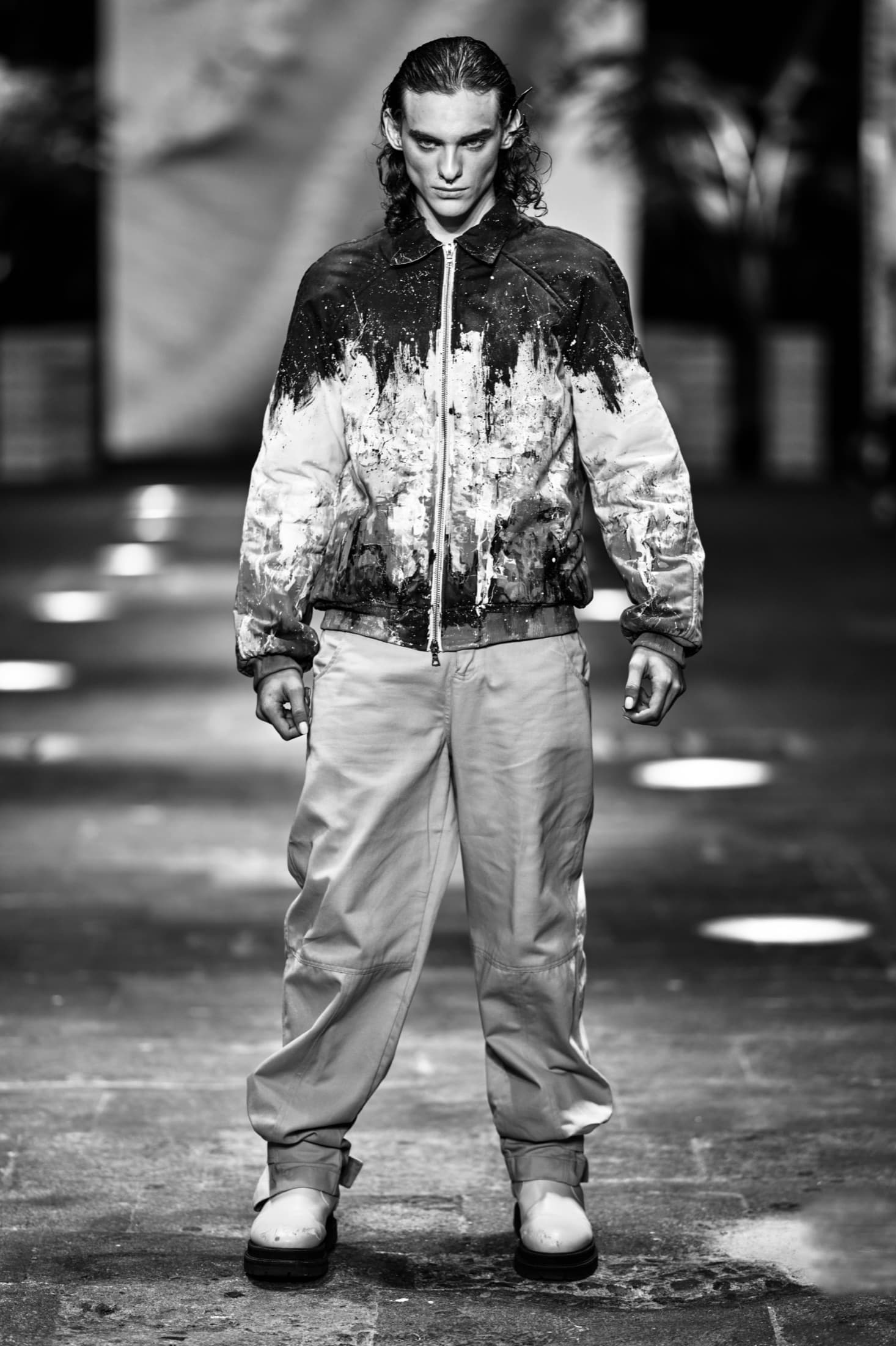 Model in a red Kangol beret and denim tailored vest with red sneakers — Costa Rica Fashion Week